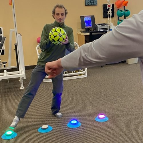 Patient at physical therapy working on coordination and balance